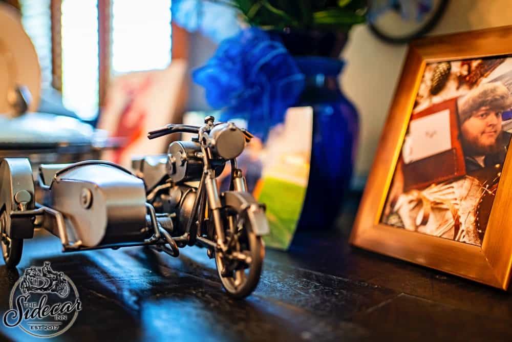 Sidecar motorcycle model on the mantel at The Sidecar Inn